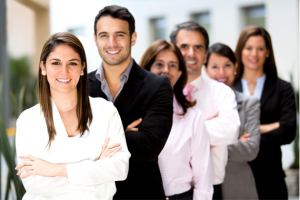 Smiling diverse business team with crossed arms