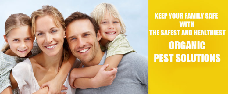 Happy family promoting organic pest solutions