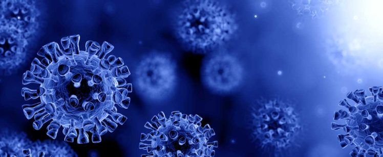 Blue coronavirus particles on dark background