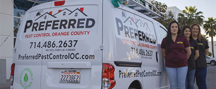 Preferred Pest Control van with three technicians